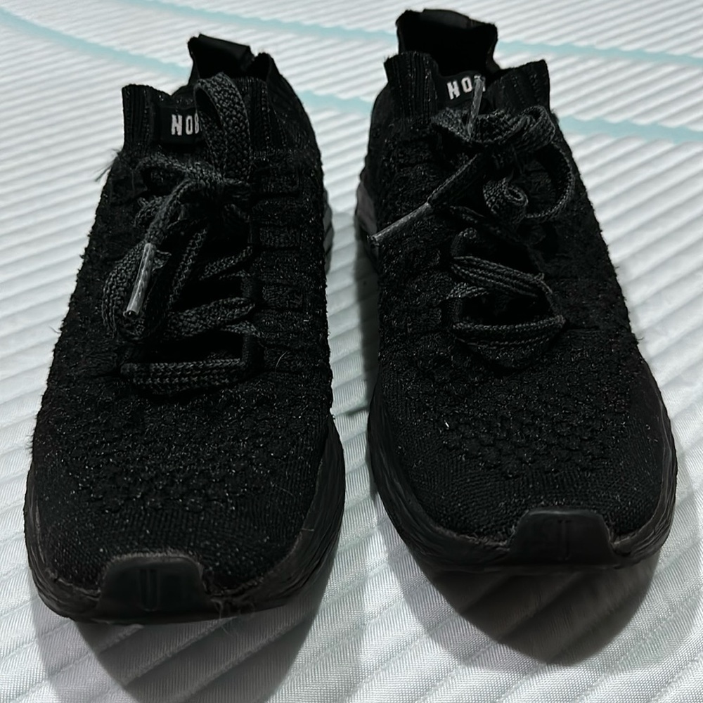 reflective black knit runner by no bull
